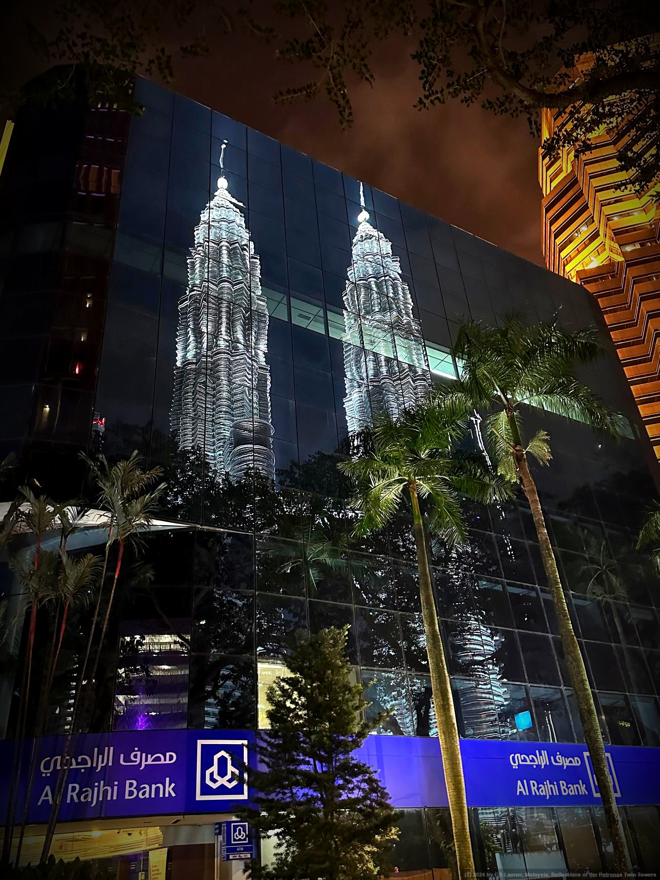 Reflections of the Petronas Twin Towers in Kuala Lumpur, Malaysia